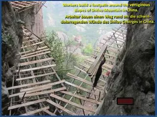 Workers build a footpath around the vertiginous slopes of Shifou Mountain in China.