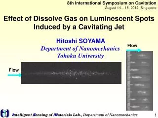 Effect of Dissolve Gas on Luminescent Spots Induced by a Cavitating Jet